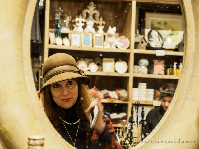 Trying on hats in New Orleans. Leslie Anne Tarabella