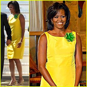michelle Obama in yellow dress and brooch